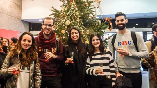 EAE students raise a glass for Christmas before the start of the school holidays